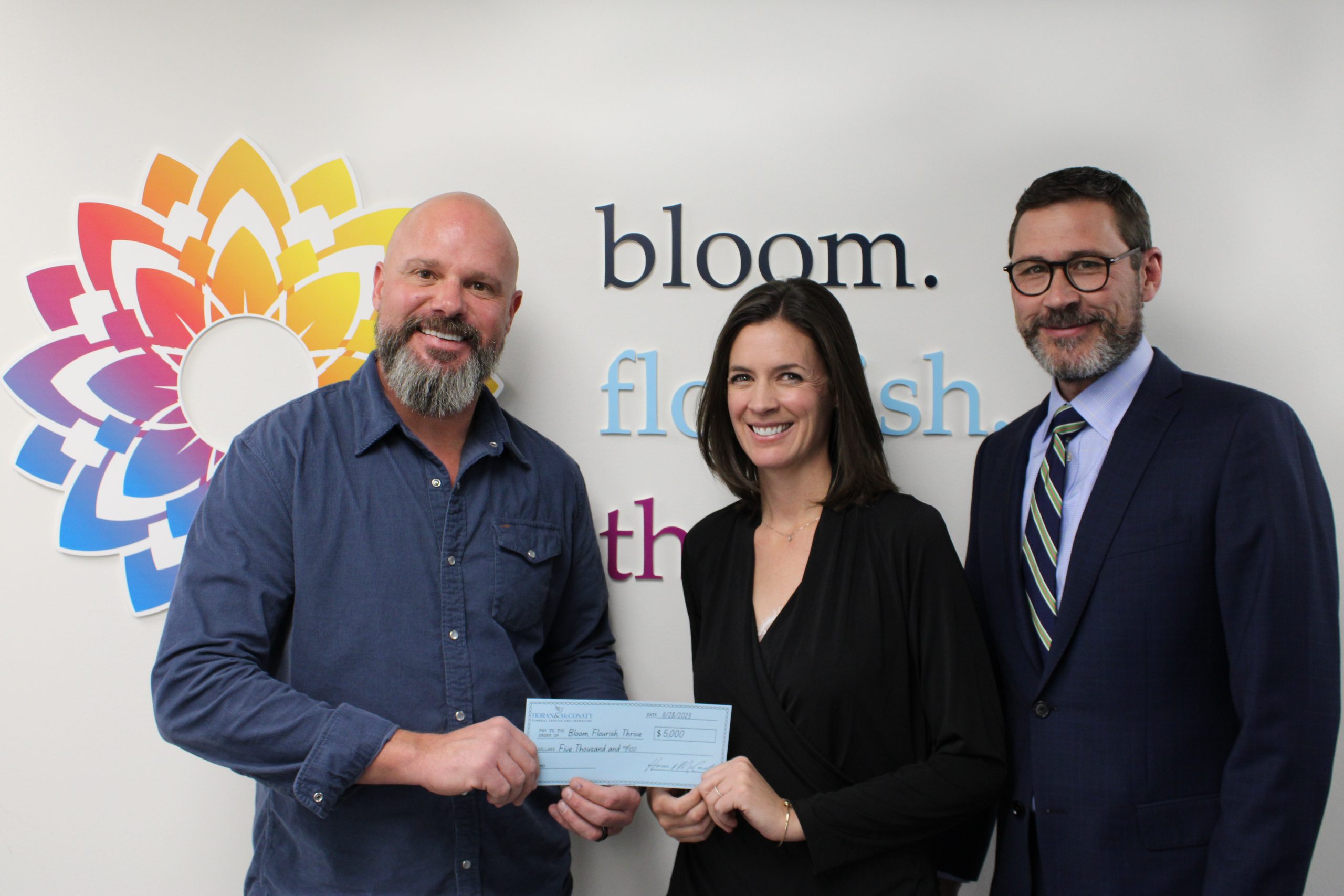 Bloom Charity reciever generous donation.